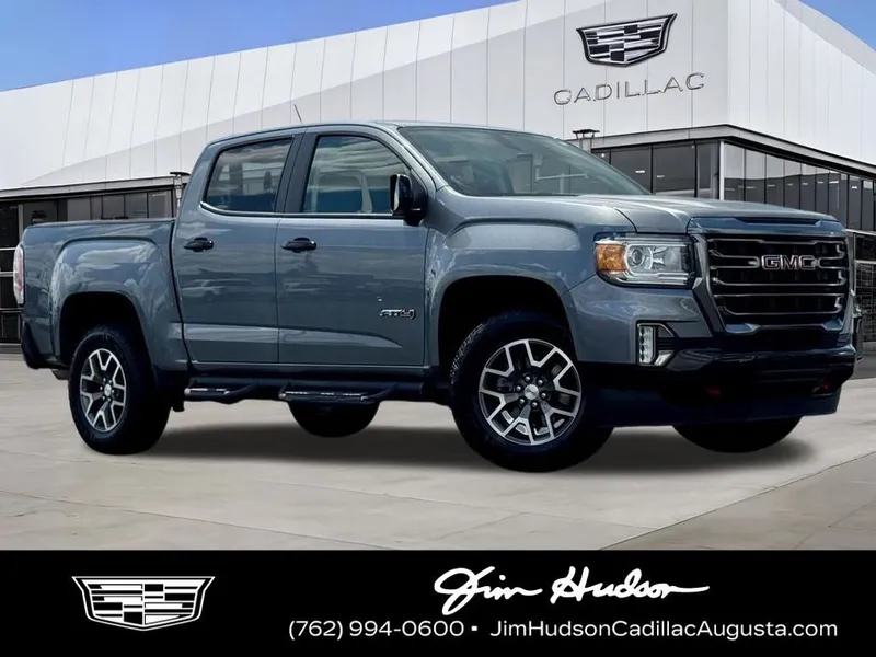 2022 GMC Canyon AT4 w/Leather in Steel Metallic — front three-quarter view