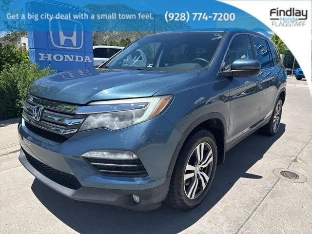 2016 Honda Pilot EX-L in Steel Sapphire Metallic — front three-quarter view