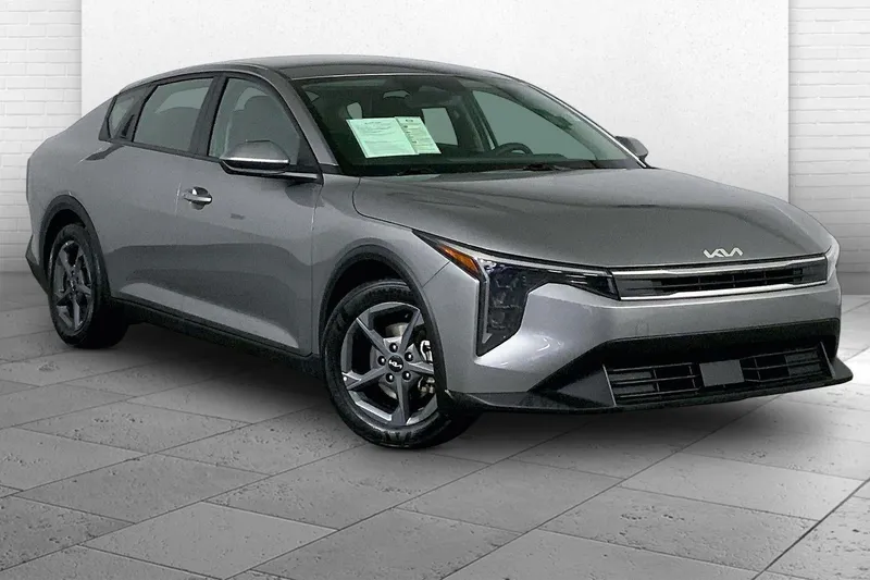 2025 Kia K4 LXS in Steel Gray — front three-quarter view