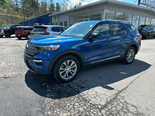 2022 Ford Explorer Limited 4WD in Blue Metallic — front three-quarter view
