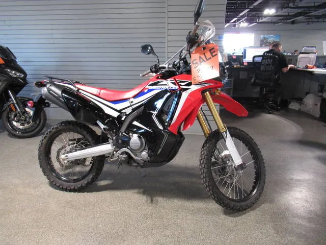2017 Honda® CRF250L Rally ABS — front three-quarter view