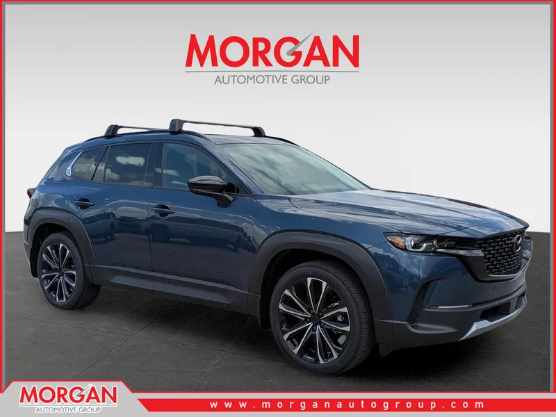2026 Mazda CX-50 2.5 Turbo Premium Plus in Ingot Blue Metallic — front three-quarter view