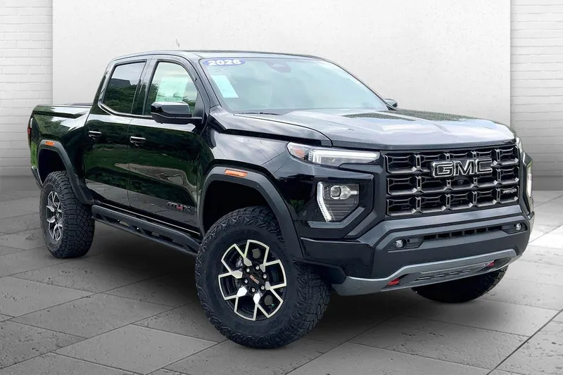 2026 GMC Canyon AT4X in Onyx Black — front three-quarter view