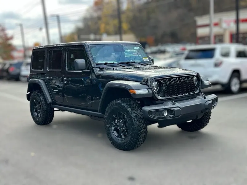 2026 Jeep Wrangler WRANGLER 4-DOOR WILLYS in Black Clear-Coat Exterior Paint — front three-quarter view