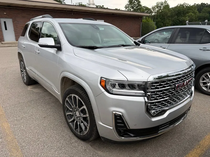 2020 GMC Acadia Denali in Quicksilver Metallic — front three-quarter view