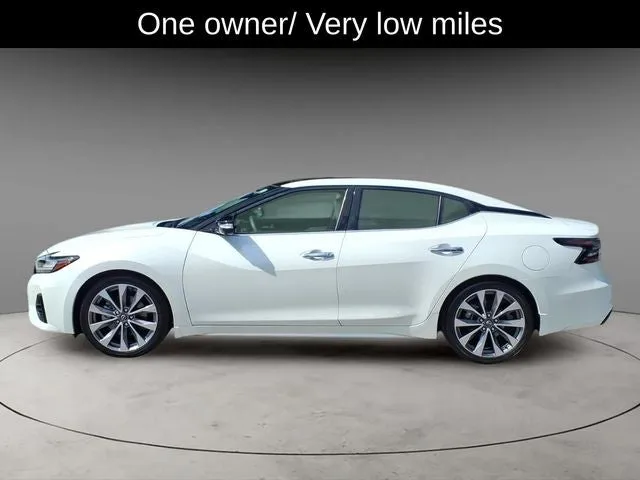 2023 Nissan Maxima Platinum in Pearl White Tricoat — front three-quarter view