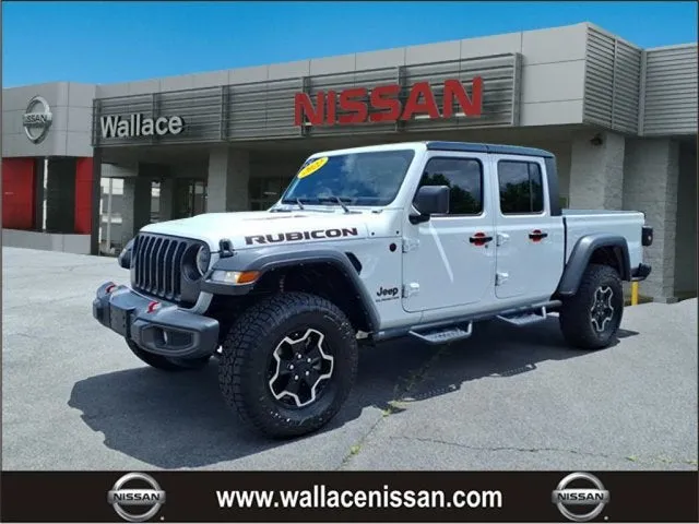 2022 Jeep Gladiator Rubicon in Bright White Clearcoat — front three-quarter view