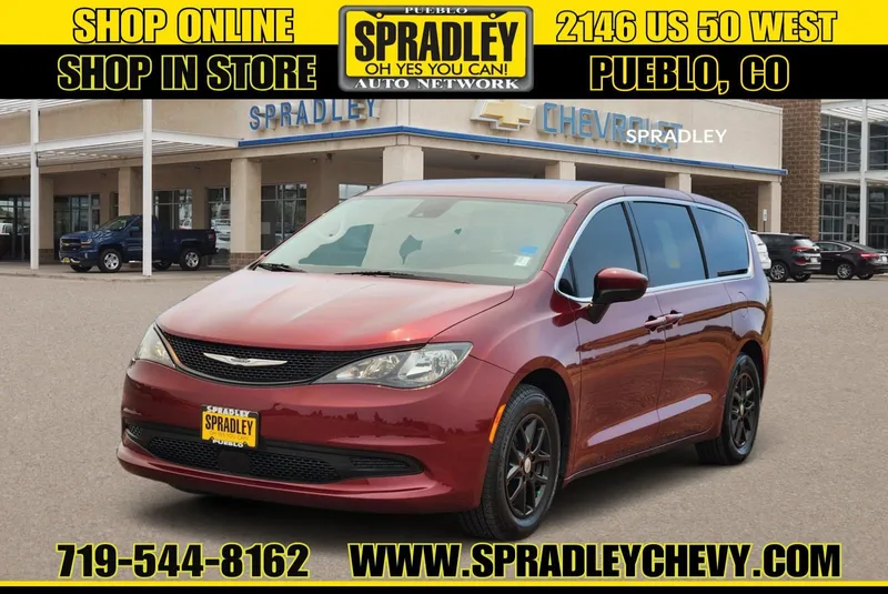 2023 Chrysler Voyager LX in Red — front three-quarter view