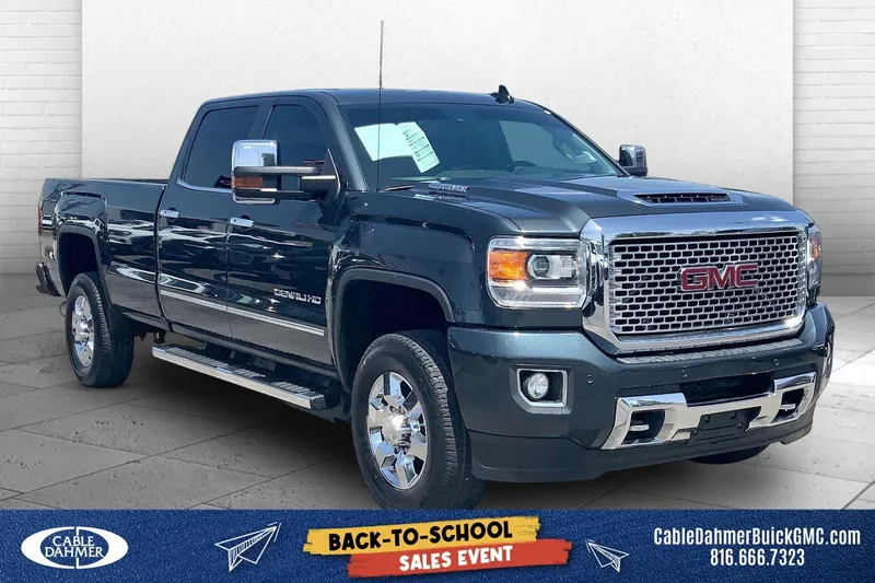 2017 GMC Sierra 3500 HD Denali in Dark Slate Metallic — front three-quarter view