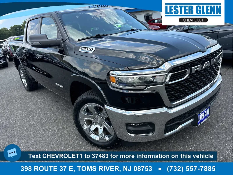 2025 RAM 1500 Big Horn Crew Cab 4x4 5'7" Box in Black — front three-quarter view
