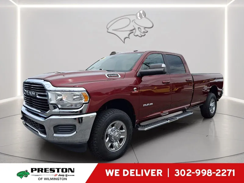 2021 RAM 2500 Big Horn in Delmonico Red Pearlcoat — front three-quarter view