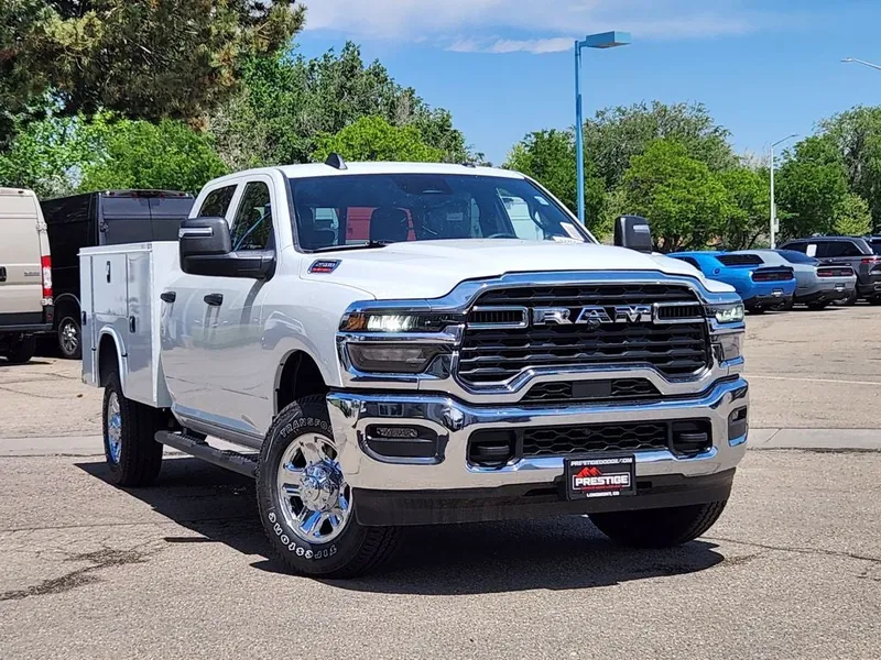 2026 RAM 2500 RAM 2500 TRADESMAN CREW CAB 4X4 8' BOX in Bright White Clear-Coat Exterior Paint — front three-quarter view