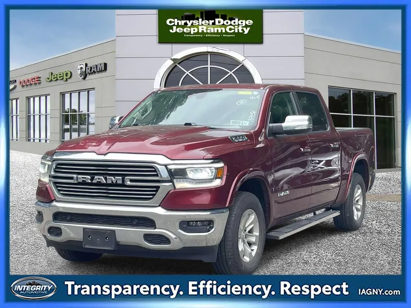 2022 RAM 1500 Laramie Crew Cab 4x4 5'7' Box in Delmonico Red Pearlcoat — front three-quarter view