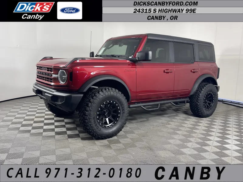 2026 Ford Bronco Big Bend in Ruby Red Metallic Tinted Clearcoat — front three-quarter view