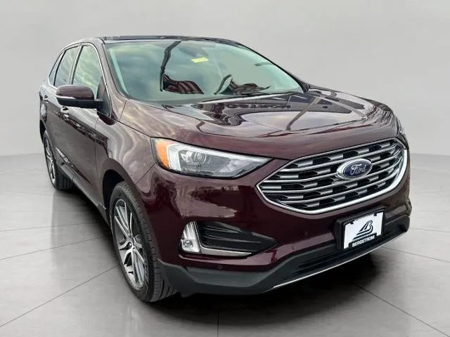 2022 Ford Edge Titanium AWD in Burgundy Velvet Metallic Tinted Clearcoat — front three-quarter view