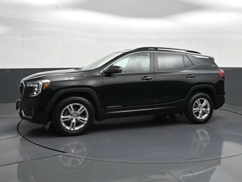 2023 GMC Terrain SLE in Ebony Twilight Metallic — front three-quarter view