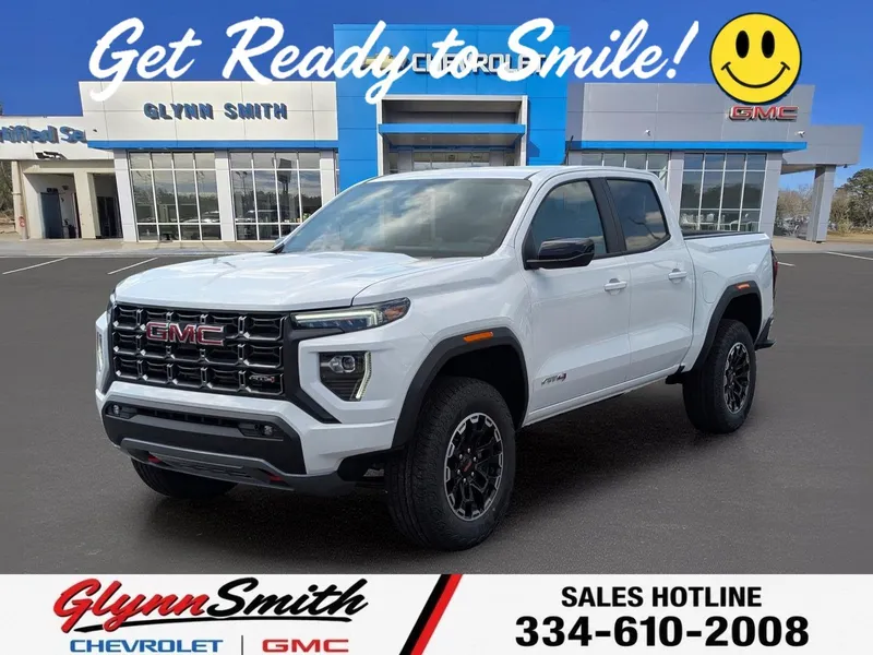 2026 GMC Canyon AT4 in Summit White — front three-quarter view