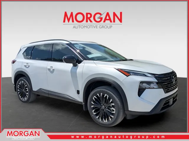 2026 Nissan Rogue Dark Armor in White — front three-quarter view