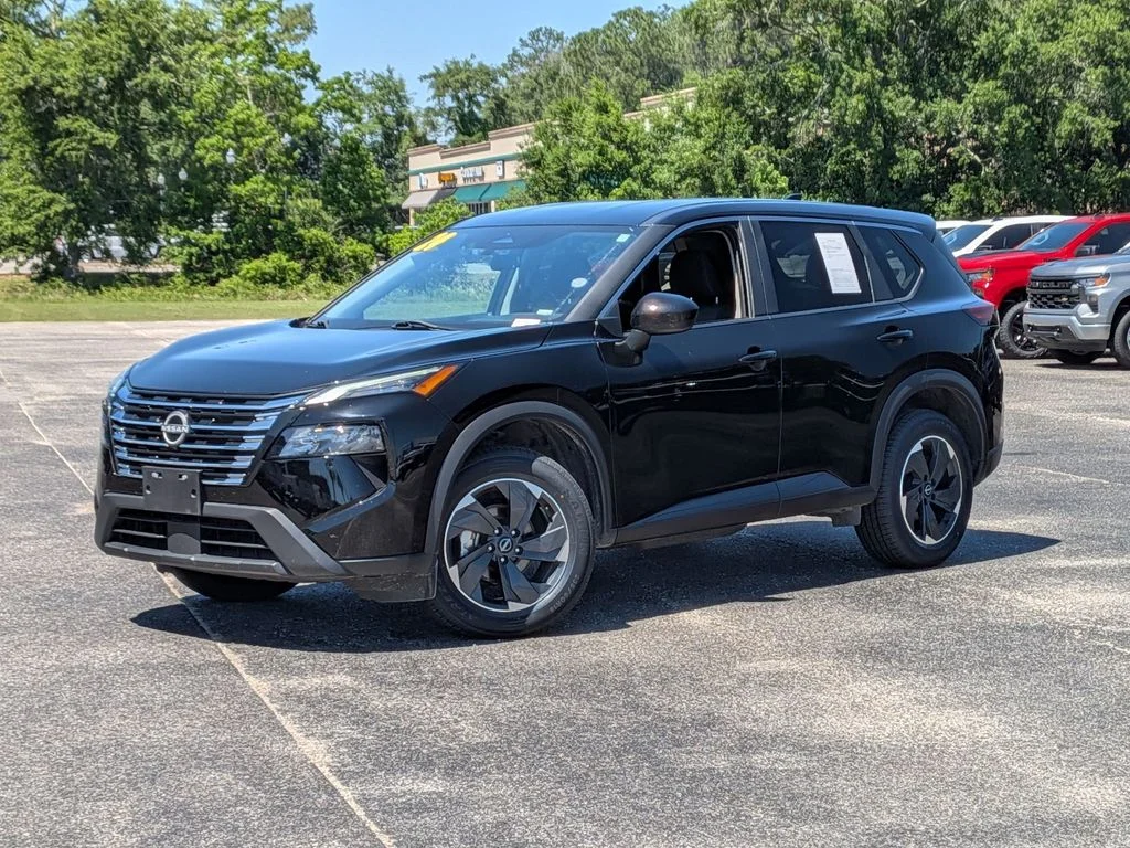 2024 Nissan Rogue SV in Black — front three-quarter view
