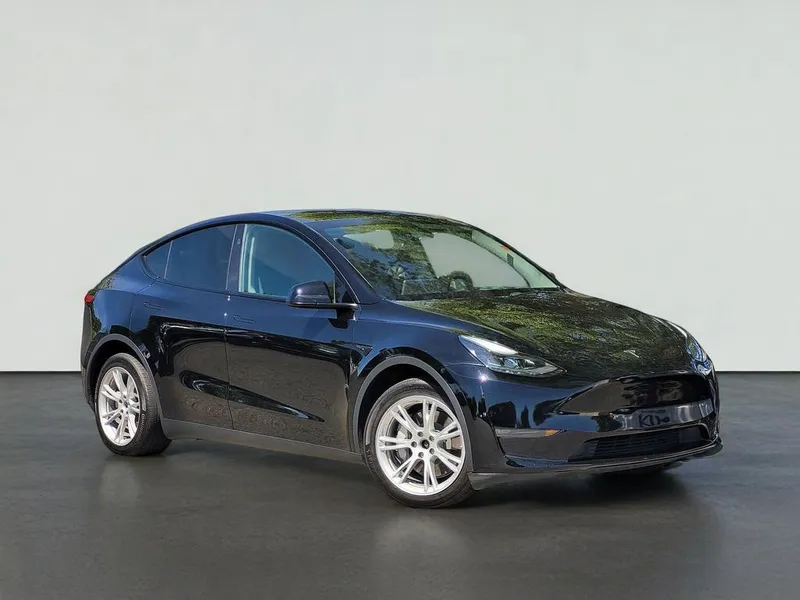 2023 Tesla MODEL Y LONG RANGE in Black — front three-quarter view