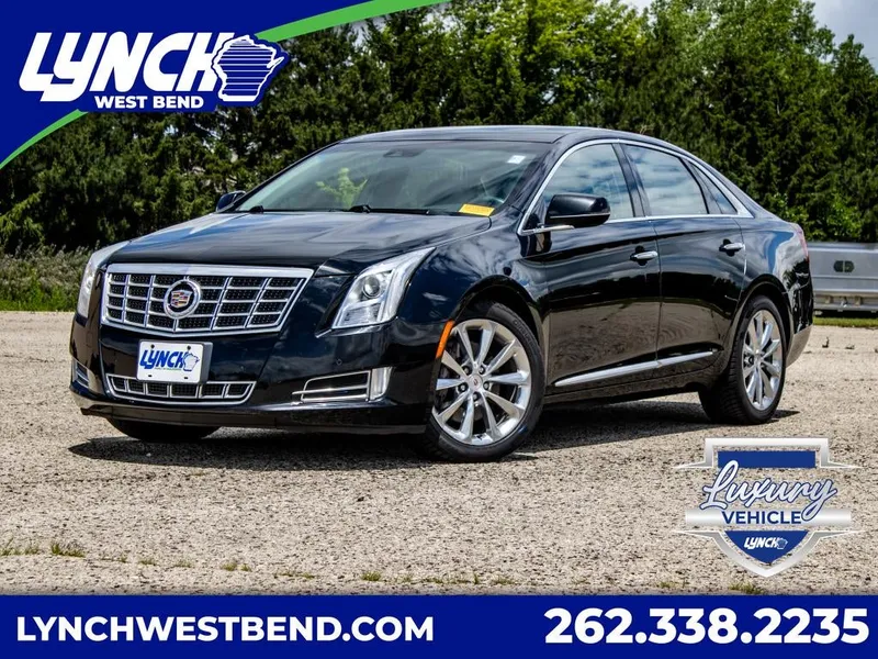 2014 Cadillac XTS Premium in Black Raven — front three-quarter view