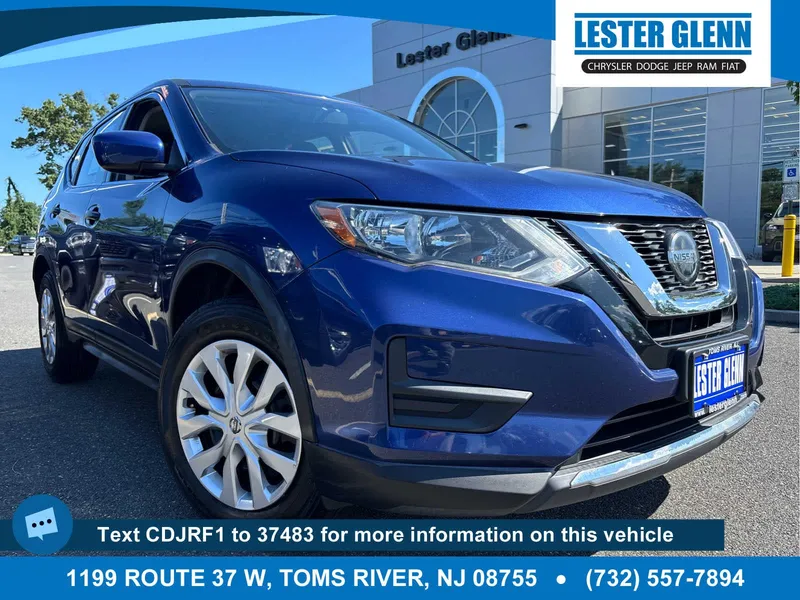 2018 Nissan Rogue S in Caspian Blue — front three-quarter view