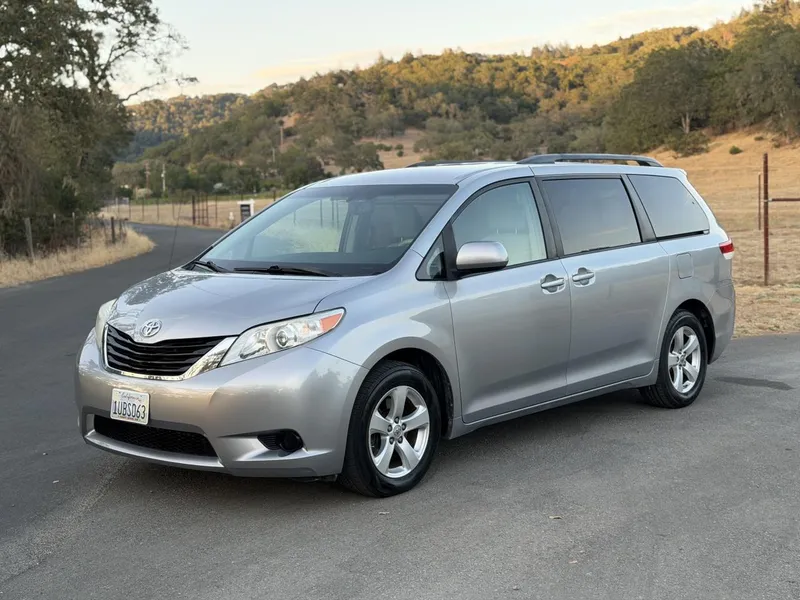 2011 Toyota Sienna in Gray — front three-quarter view