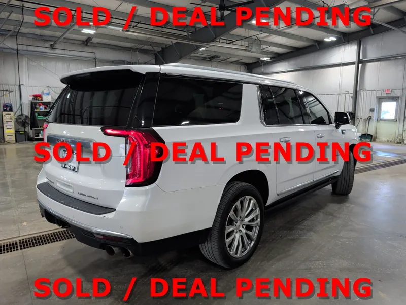 2023 GMC Yukon XL — rear three-quarter view