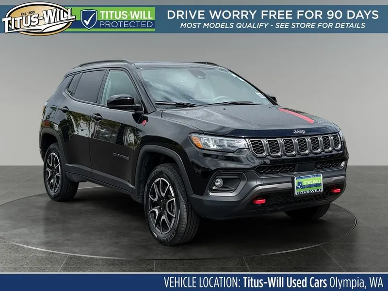 2024 Jeep Compass Trailhawk in Diamond Black Crystal Pearlcoat — front three-quarter view