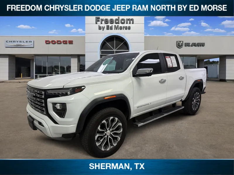 2024 GMC Canyon 4WD Denali in Summit White — front three-quarter view