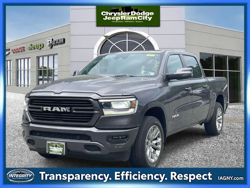 2023 RAM 1500 Laramie Crew Cab 4x4 5'7' Box in Granite Crystal Metallic Clearcoat — front three-quarter view