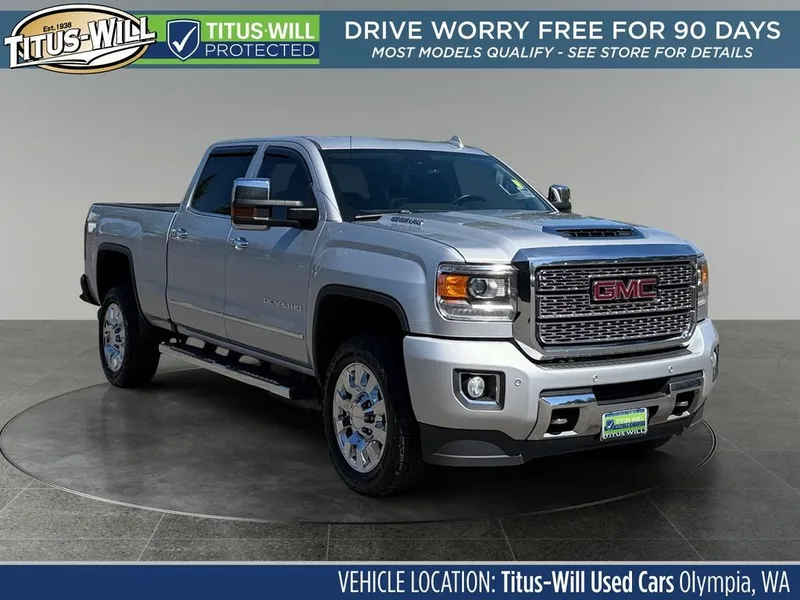 2019 GMC Sierra 2500HD Denali in Quicksilver Metallic — front three-quarter view