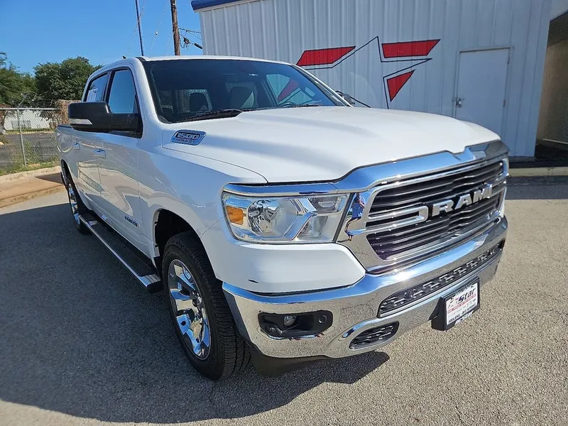 2021 RAM 1500 Big Horn/Lone Star in Bright White Clearcoat — front three-quarter view