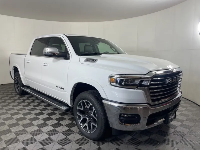 2026 RAM 1500 RAM 1500 LARAMIE CREW CAB 4X4 5'7' BOX in Bright White Clear-Coat Exterior Paint — front three-quarter view