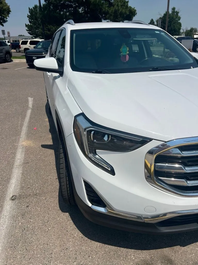 2019 GMC Terrain SLT in Summit White — front three-quarter view