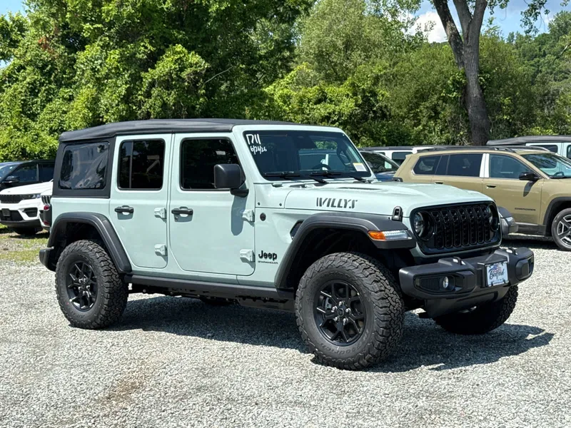 2026 Jeep Wrangler Willys in Earl Clearcoat — front three-quarter view