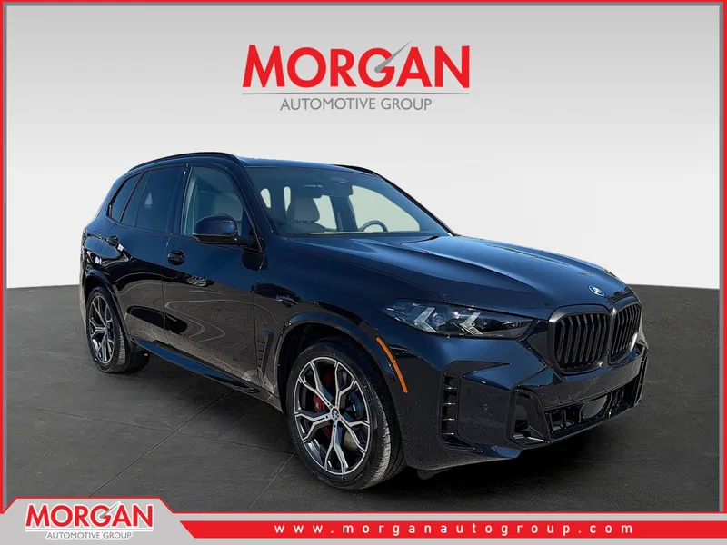 2026 BMW X5 xDrive50e in CARBON BLK MET — front three-quarter view