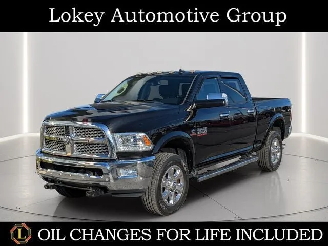 2017 RAM 3500 Laramie in Brilliant Black Crystal Pearlcoat — front three-quarter view