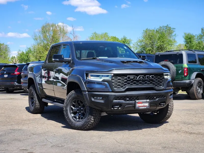 2026 RAM 1500 RAM 1500 RHO CREW CAB 4X4 5'7' BOX in Forged Blue Metallic Exterior Paint — front three-quarter view