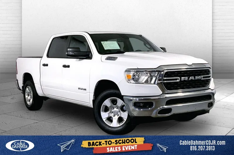 2023 RAM 1500 Big Horn Crew Cab 4x4 5'7' Box in Bright White Clearcoat — front three-quarter view