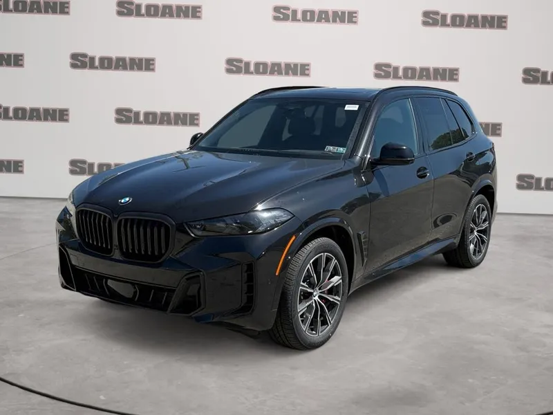 2026 BMW X5 xDrive40i in Black Sapphire Metallic — front three-quarter view