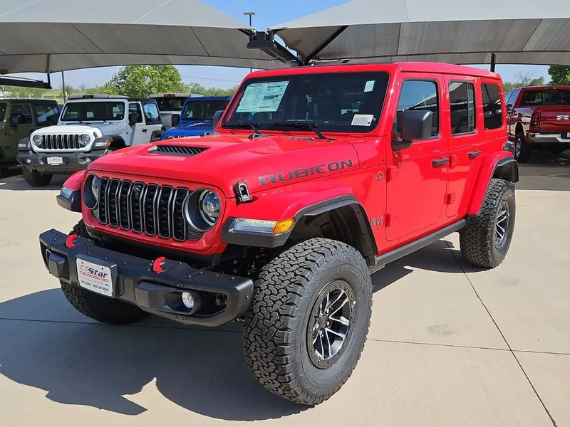 2026 Jeep Wrangler Rubicon X in Firecracker Red Clearcoat — front three-quarter view