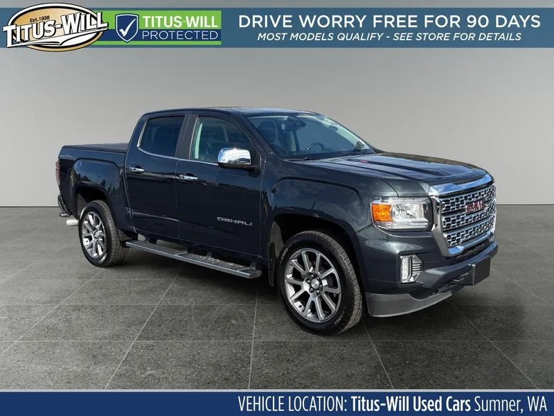 2021 GMC Canyon Denali in Hunter Green — front three-quarter view