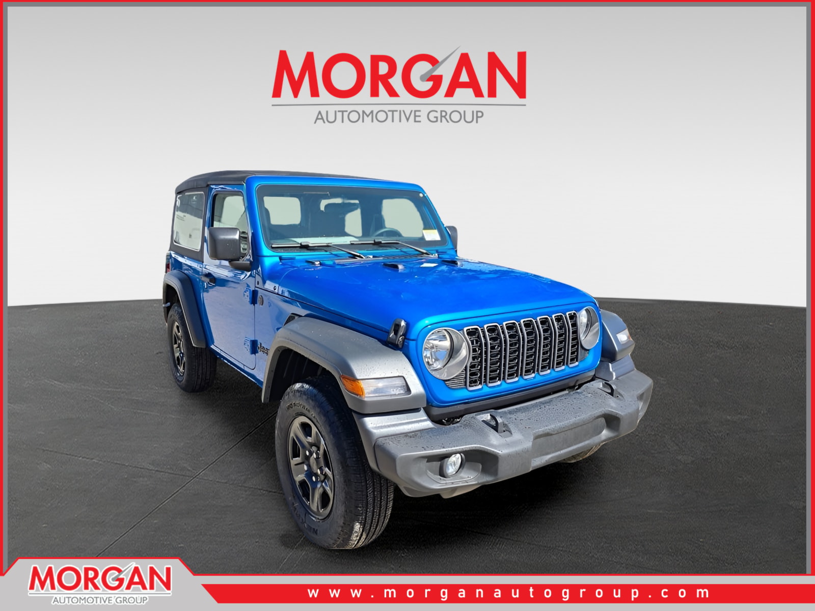2026 Jeep Wrangler Sport in Hydro Blue Pearlcoat — front three-quarter view