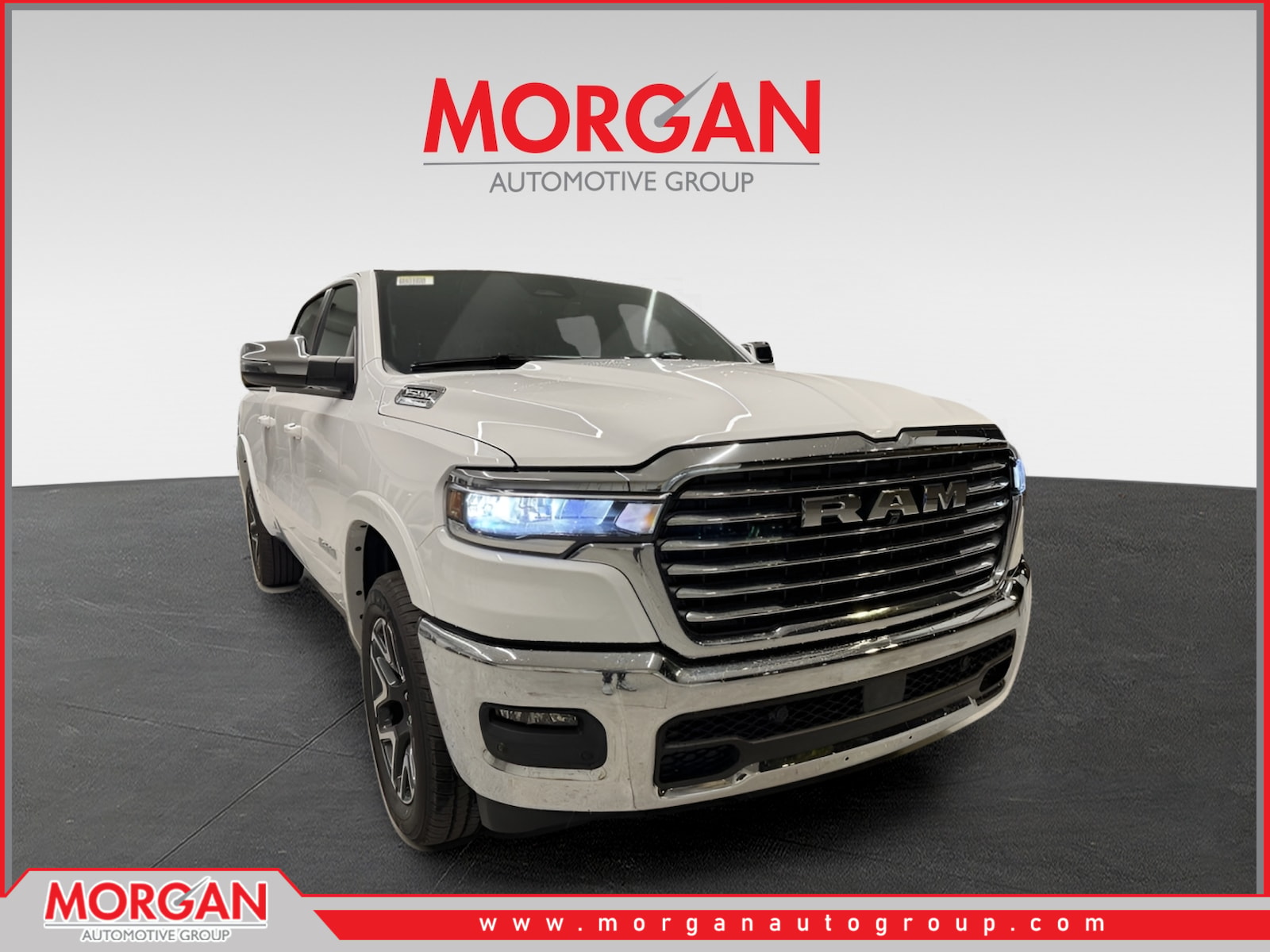 2026 Ram 1500 Laramie in Bright White Clearcoat — front three-quarter view
