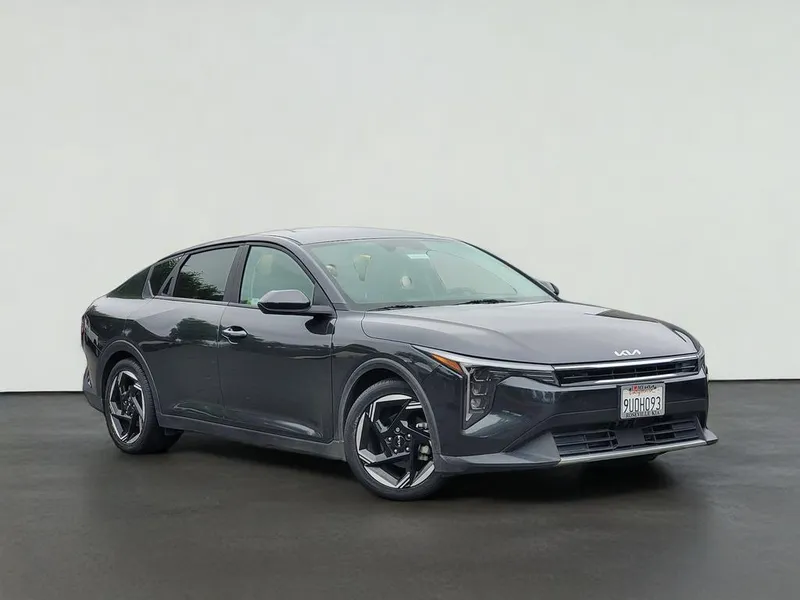 2025 Kia K4 EX in Interstellar Gray — front three-quarter view