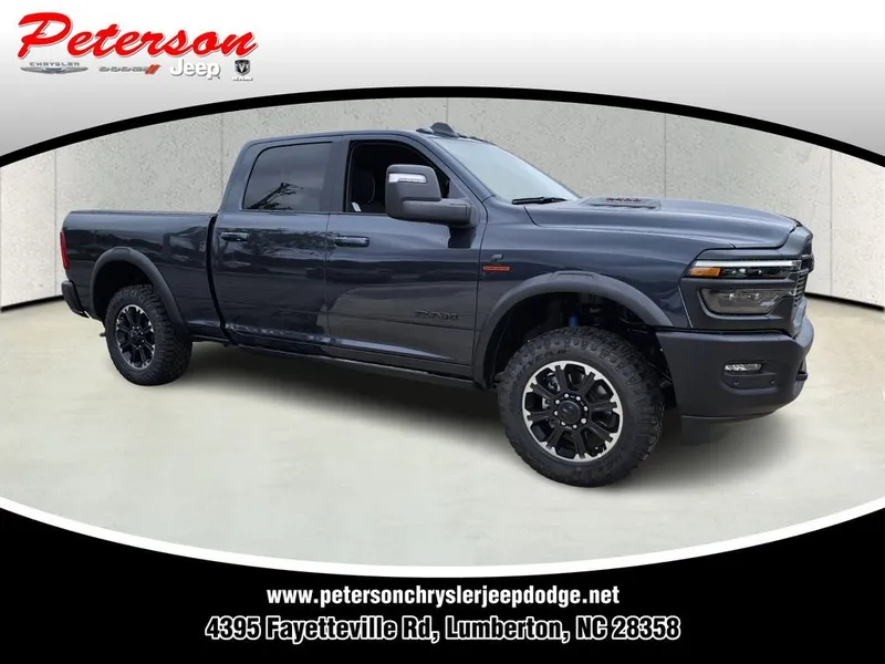 2026 RAM Ram 2500 RAM 2500 REBEL CREW CAB 4X4 6'4' BOX in Forged Blue Metallic Exterior Paint — front three-quarter view