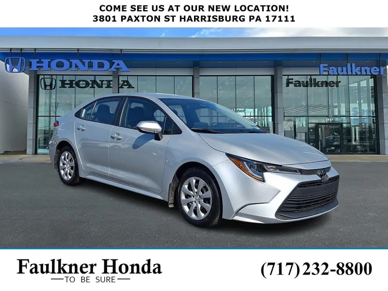 2025 Toyota Corolla LE CVT (Natl) in Classic Silver Metallic — front three-quarter view