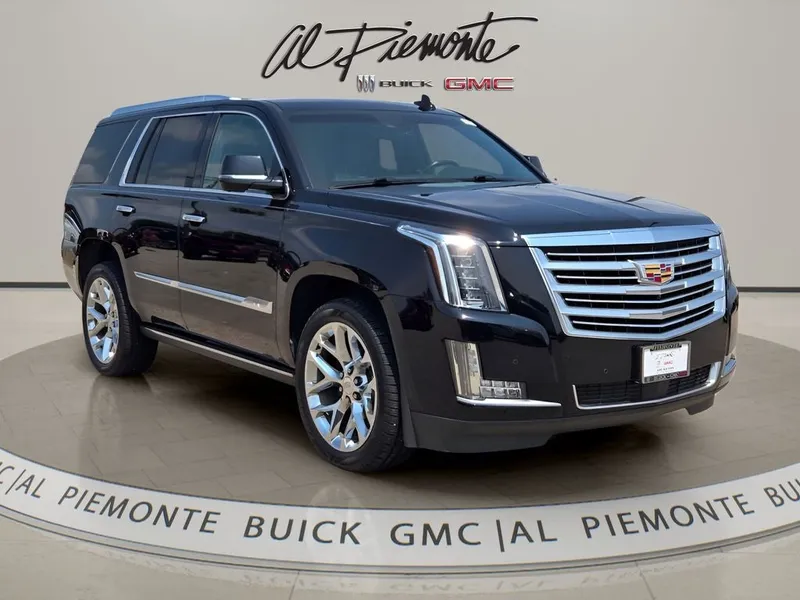 2016 Cadillac Escalade Platinum Edition in Black Raven — front three-quarter view