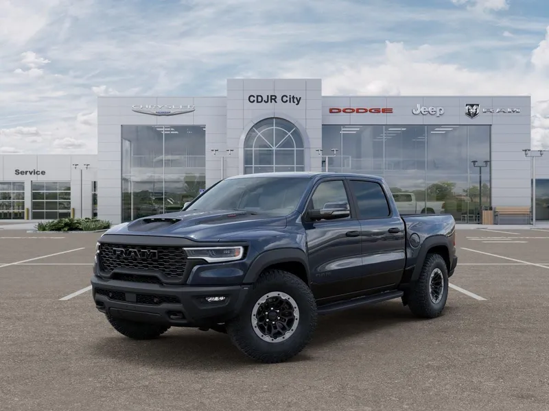 2026 RAM Ram 1500 RAM 1500 RHO CREW CAB 4X4 5'7' BOX in Forged Blue Metallic Exterior Paint — front three-quarter view